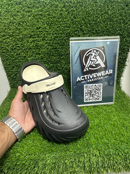 Men's adventure-ready black clogs – ER-8745, with breathable holes and durable design, by Activewear Pakistan.